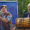 Jim Lewin and Eric Hedberg sing at the World Food Fest. Des Moines, IA.